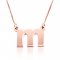 Lowercase initial necklace in 18k rose gold plating