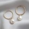Gold filled hoop earrings with baroque pearl