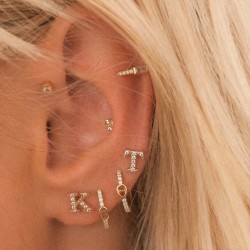 Initial stud earrings in sterling silver and cubic zirconia  Initial stud earrings in sterling silver and cubic zirconia