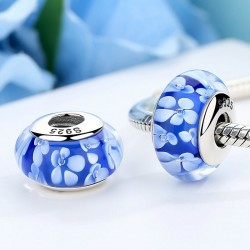 blue glass bead with white flowers blue glass bead with white flowers