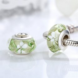 clear-green glass bead with flowers clear-green glass bead with flowers