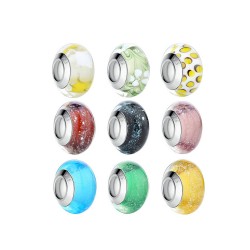 clear-green glass bead with flowers