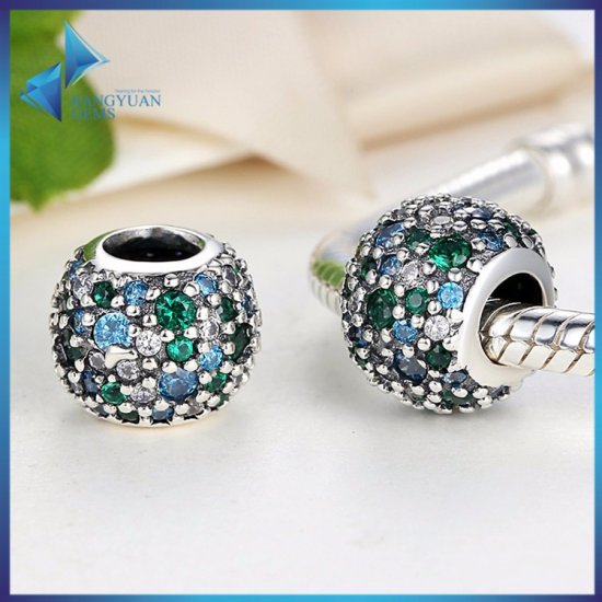 silver bead with blue-green zirconia