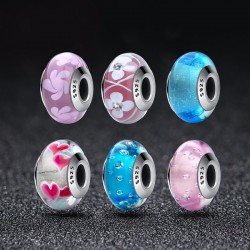 pink glass bead with white flowers