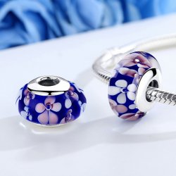 purple glass bead with pink and white flowers